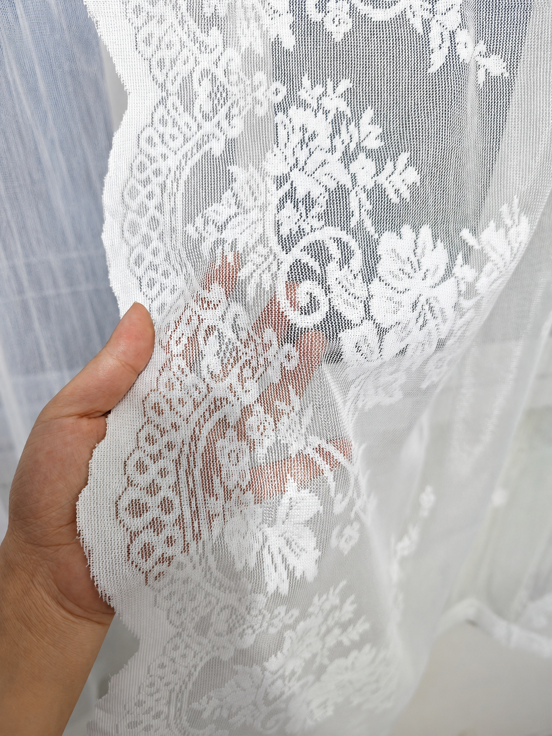Close view of the floral lace pattern